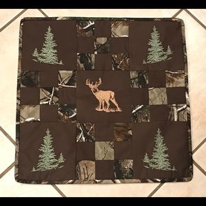 Handmade embroidered deer wall hanging.